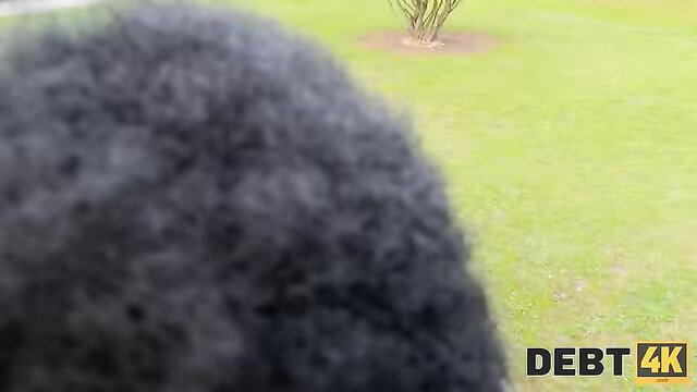 Closeup of black woman's curly hair in outdoor amateur porn thumbnail