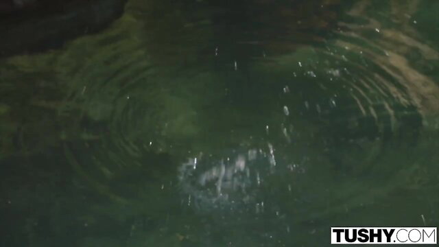 Paris White in Tushy anal scene, closeup green water ripples