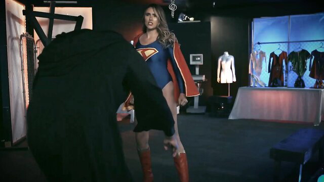 Hot Latina Supergirl in tight costume poses sexy in dressing room