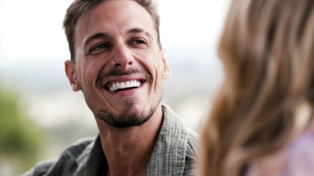 Ella Reese smiles at handsome man in romantic outdoor Brazzers scene