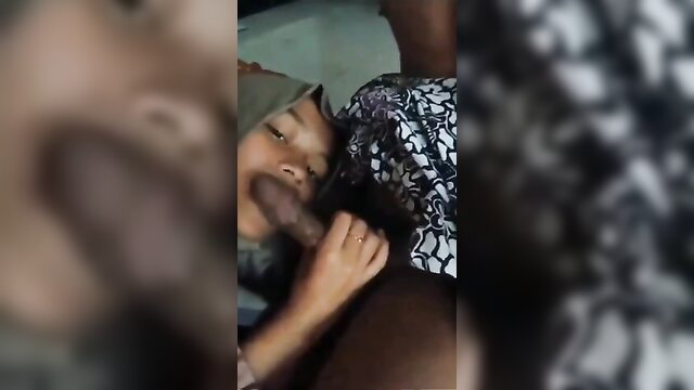 Indonesian girl sucking thick cock lying on bed amateur blowjob