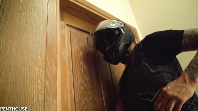 Jayla Femjoy as runaway bride in helmet and leather vest by door