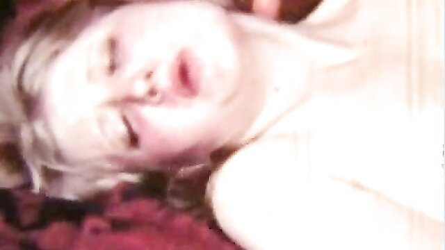 Blonde woman in ecstasy closeup from O.Z. Films 85 Hot Cock hardcore porn