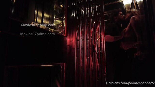 Poonam Pandey hot sex tape in red room with man kissing