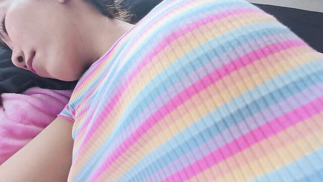 Cute 18yo Asian girlfriend sleeping in colorful ribbed tank top