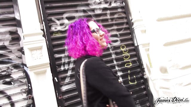 Violet with purple hair poses sexy by graffiti for James Deen fuck audition