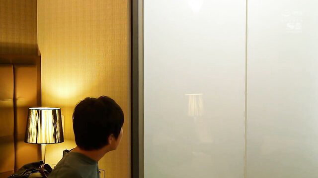 Yua Mikami as busty female boss peeking through frosted doors