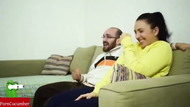 Hot Arab beauty laughing with man on couch in teasing amateur clip