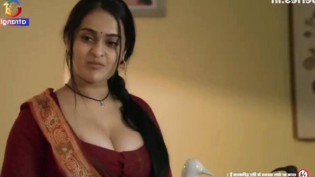 Indian bhabhi in deep cleavage saree blouse, seductive pose