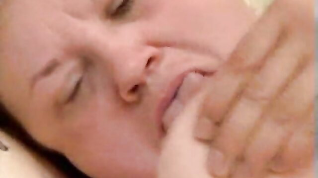 Nasty housewife with fingers in mouth closeup preview