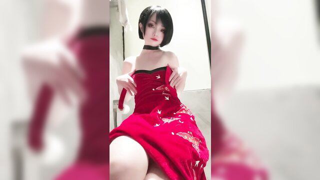 Asian cosplay girl in sexy red dress, black bob hair, seductive pose