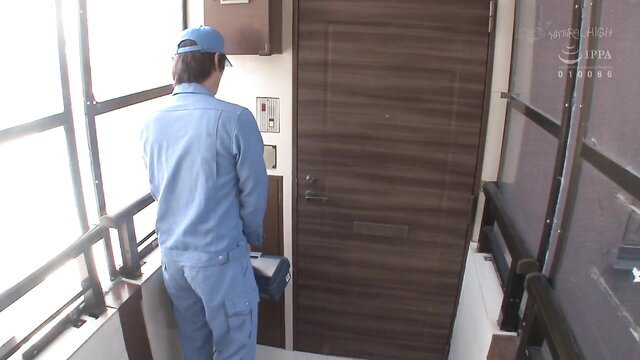Japanese repairman in uniform at apartment door, JAV preview