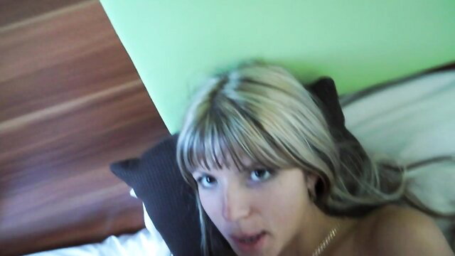 Skinny blonde Gina Gerson nude on bed, closeup face and tits