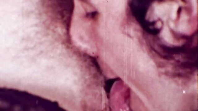 Retro porn closeup of woman's wet tongue licking in Silver and Lace