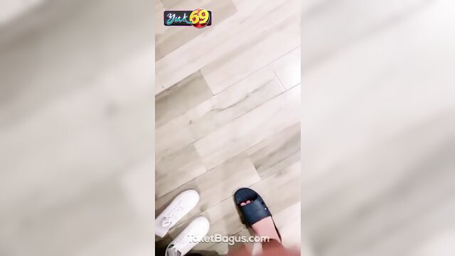 Asian woman feet in white sneakers and black flip flops POV tease