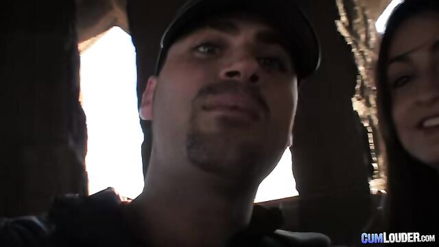 Sandra Milka smiles with man in cap outdoor amateur selfie