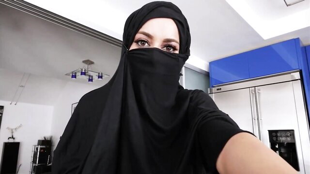 Veiled Arab MILF in niqab and hijab, big tits tease in kitchen selfie