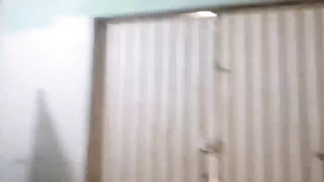 Blurry view of closed beige closet doors in dim room, stepmom spying scene