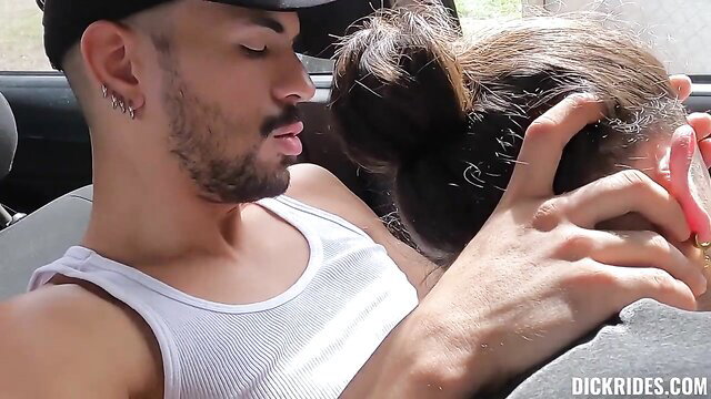 Hot guy grabs brunette's face for deepthroat blowjob in car POV