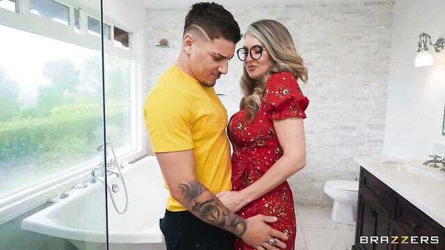 Gigi Dior in red dress kissed by tattooed guy in yellow shirt Brazzers