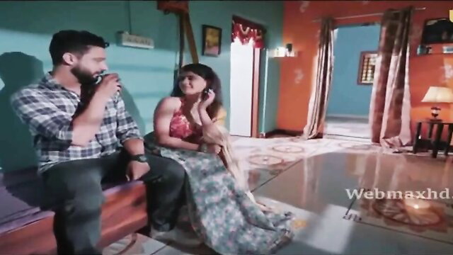 Indian couple in saree blouse on couch, Ullu Ek Haseena Thi