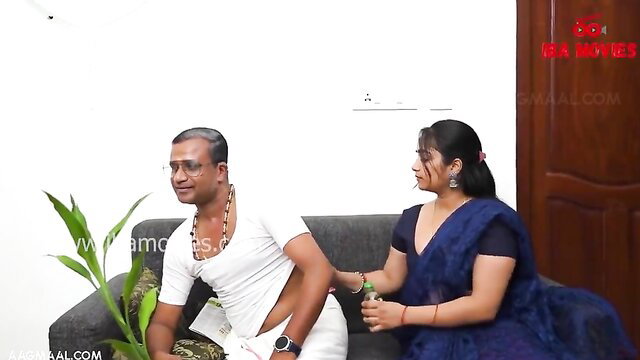 Indian chubby wife in saree sits with man on couch in hot desi scene