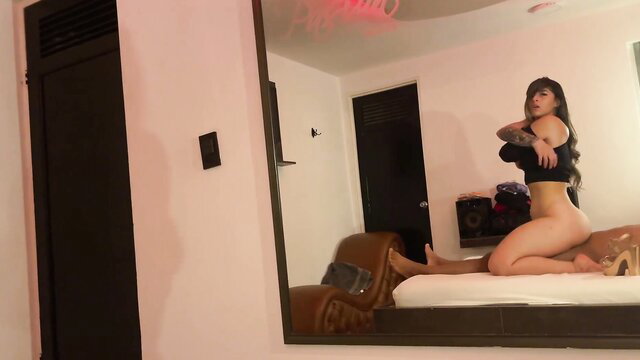 Angel-Victoria kneels topless, big ass out in sexy pose