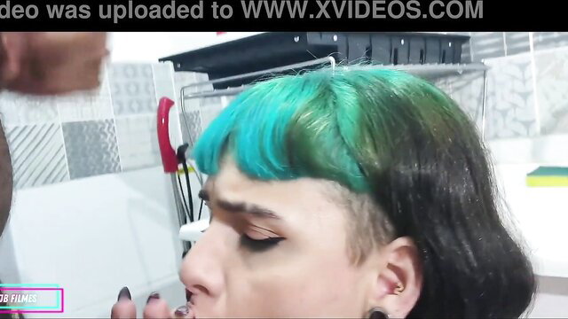 Teal-haired alt girl with piercings sucks cock in hot kitchen BJ