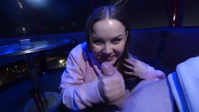 Pretty teen hottie sucking cock in amusement park hoodie POV