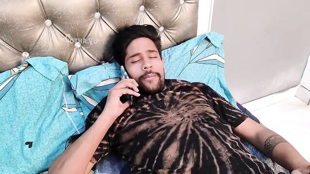 Handsome Indian man with beard on phone in bed, Family Doctor webseries thumbnail