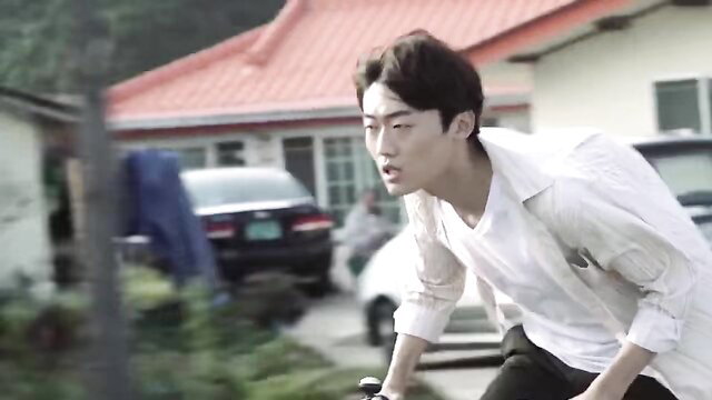 Young Mother 4: handsome Korean guy in white shirt biking outdoors