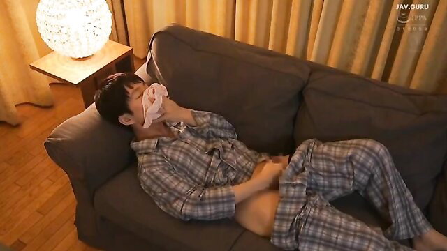 Asian man in pajamas grabbing crotch on couch, JAV mother-in-law tease