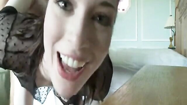 Smiling brunette nympho in sexy black lace lingerie closeup