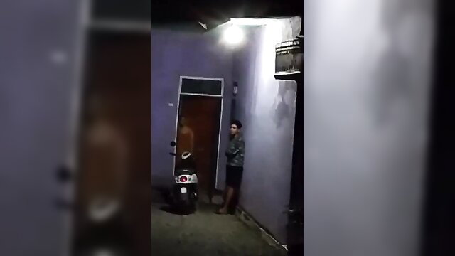 Asian amateur peeking at busty neighbor in skirt outside house