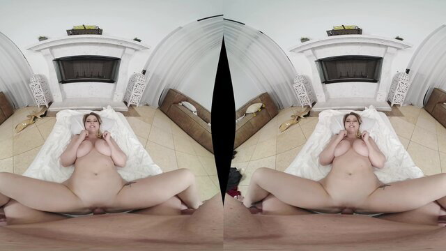 Nude curvy blonde woman sitting spread legs exposing pussy on bed