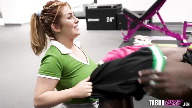 Chloe Cooper in green top holds clothes with BBC basketball player