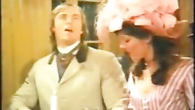 Josefine Mutzenbacher 2: Vintage couple in period costumes kissing passionately