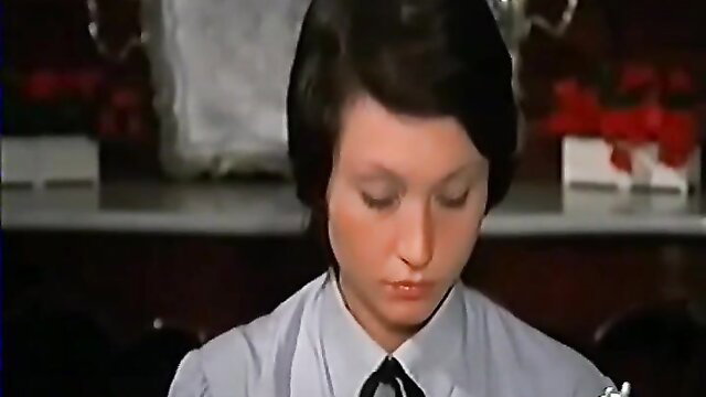 Young Asian woman in schoolgirl shirt and tie, closeup portrait