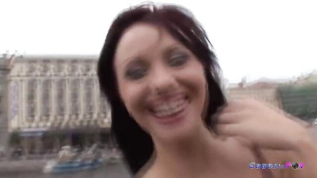 Alisa Gap smiling outdoors closeup, big eyes makeup, explicit ass play star