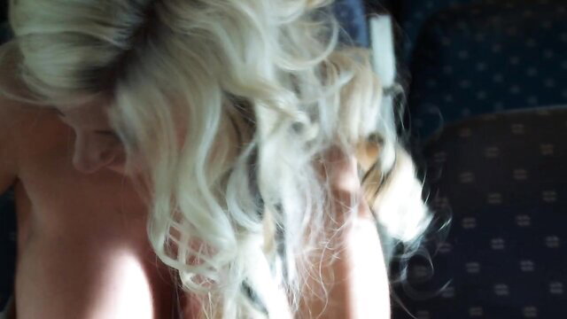 Blonde stewardess topless with huge tits in airplane seat