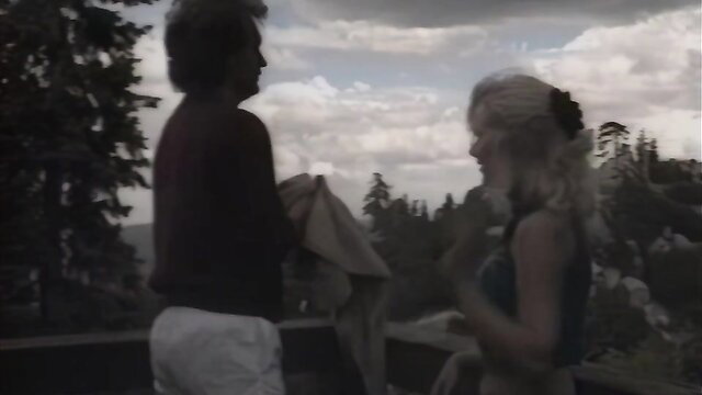 Taboo 6 blonde woman chats intimately with man outdoors on balcony