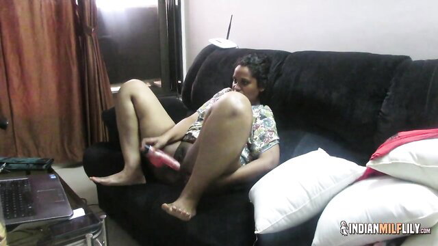 Indian MILF with big tits squeezes dildo fucking herself