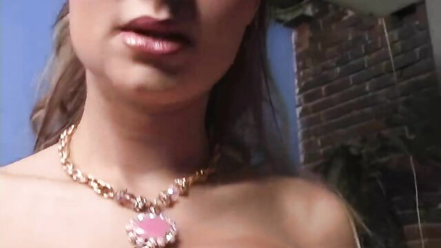 Gorgeous Amy Reid closeup in sexy pink necklace jewelry
