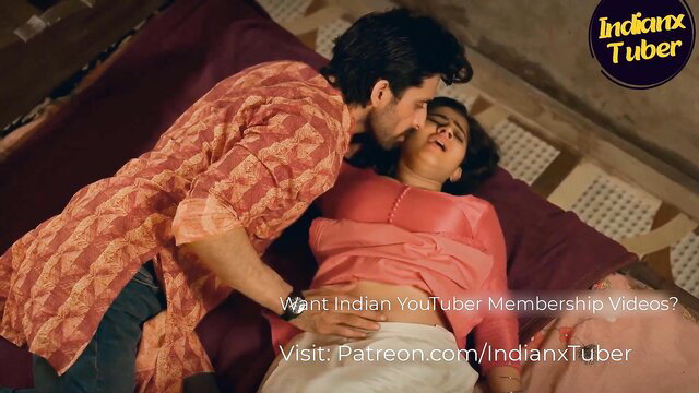 Indian bhabhi in pink saree passionately kissed by man on bed