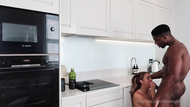 Lily Phillips sucks Mike Williams BBC in kitchen