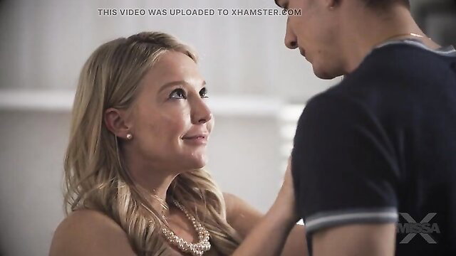 Laura Bentley smiles intimately with handsome man in steamy closeup