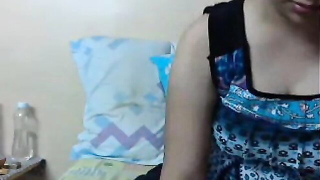 Amateur Indian brunette teases big boobs on webcam