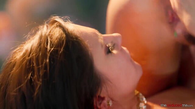 Darcie Dolce and Milana Ricci close-up lesbian kiss in The Informant