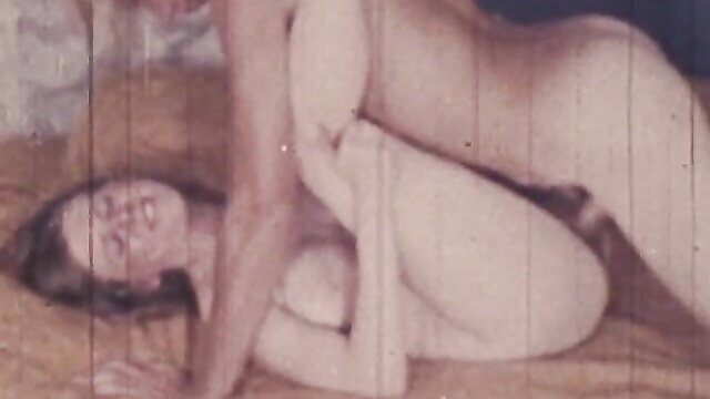 Vintage porn thumbnail: nude brunette in side missionary fuck on bed