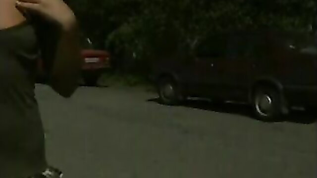 Playful teen babe in sexy skirt flashes booty outdoors by car